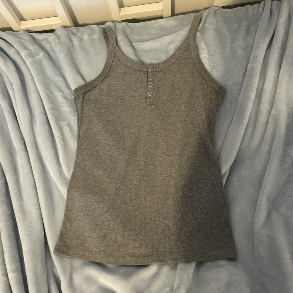 Gray medium tank top with scoop neck and silver buttons